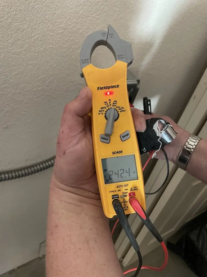 Voltage testing with clamp meter during Hot Tub / Pool Electrical Wiring in Black Forest